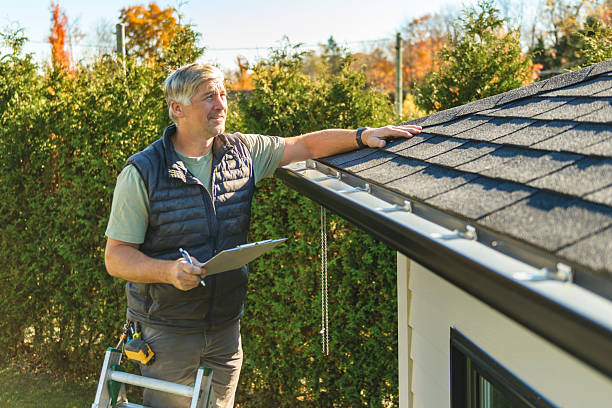 Professional Roof Inspection technician working in Deer Island, OR